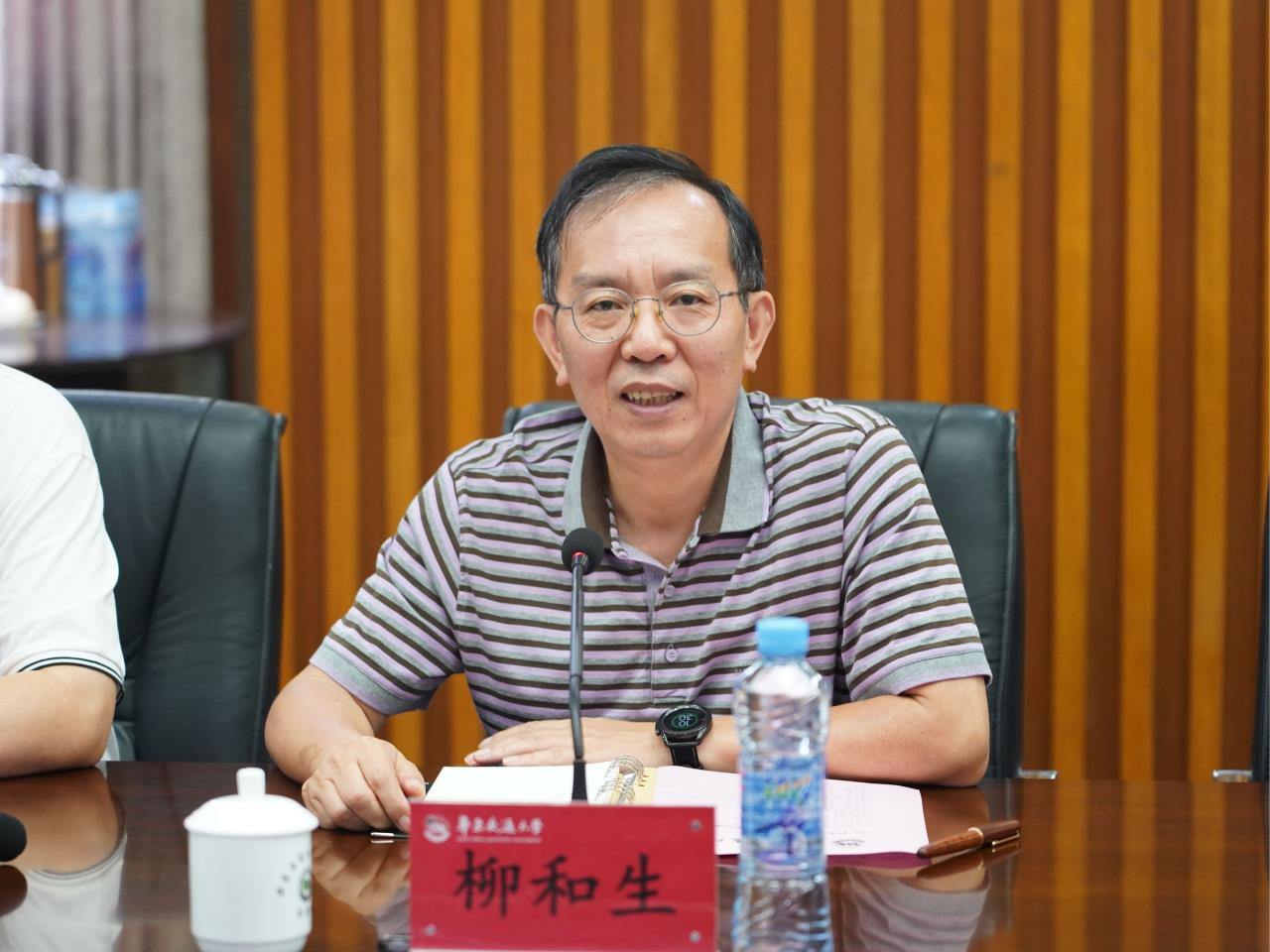 崇仁县委书记周国华一行来校走访交流